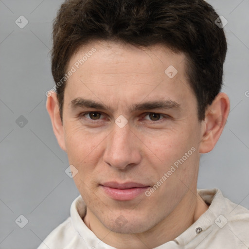 Joyful white young-adult male with short  brown hair and brown eyes