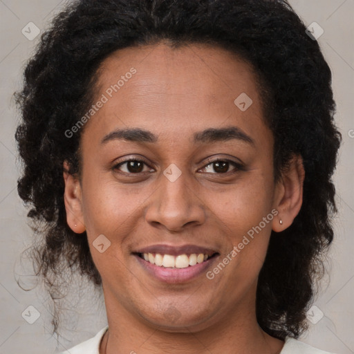 Joyful latino young-adult female with medium  brown hair and brown eyes