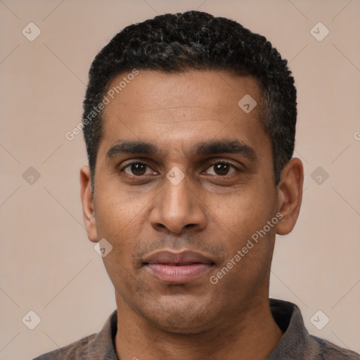Neutral latino young-adult male with short  black hair and brown eyes