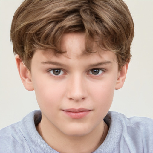 Joyful white child male with short  brown hair and grey eyes