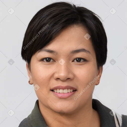 Joyful asian young-adult female with short  black hair and brown eyes