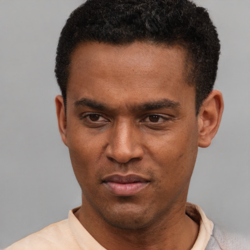 Neutral latino young-adult male with short  brown hair and brown eyes