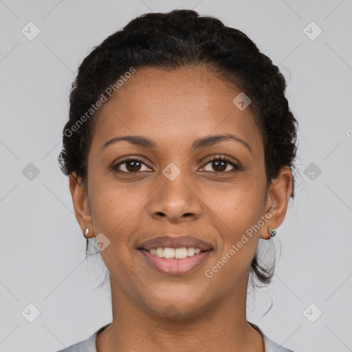 Joyful latino young-adult female with short  brown hair and brown eyes