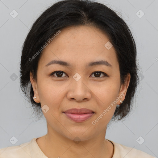 Joyful asian young-adult female with medium  brown hair and brown eyes