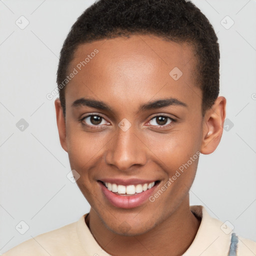 Joyful black young-adult male with short  brown hair and brown eyes