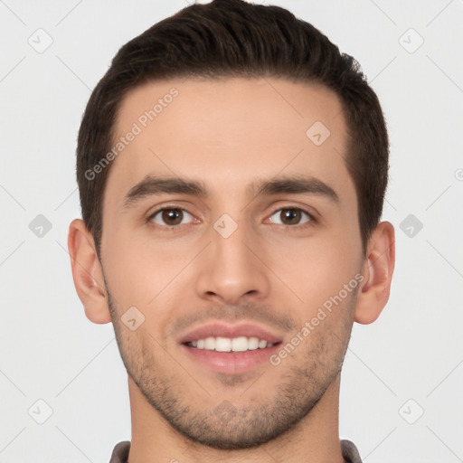 Joyful white young-adult male with short  brown hair and brown eyes