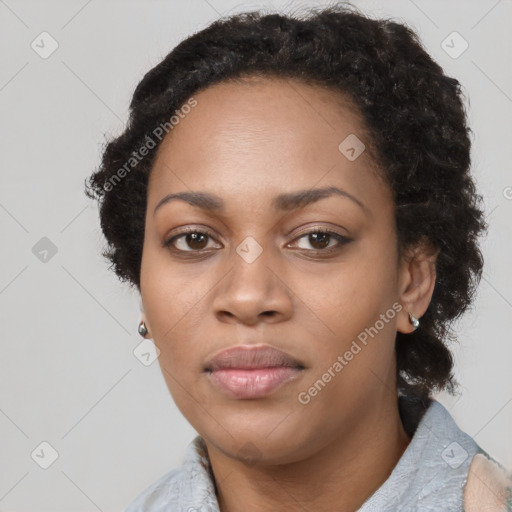 Neutral black young-adult female with short  black hair and brown eyes