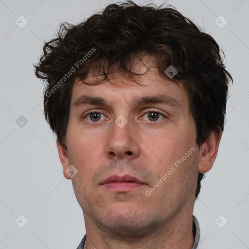 Neutral white adult male with short  brown hair and brown eyes