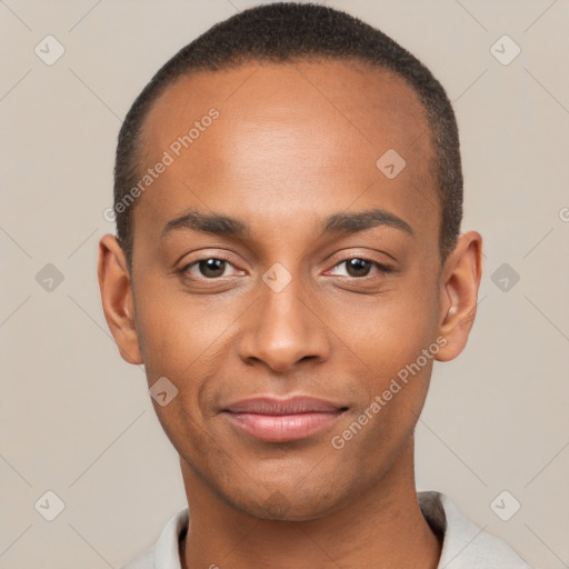 Joyful black young-adult male with short  brown hair and brown eyes