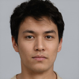 Neutral asian young-adult male with short  brown hair and brown eyes