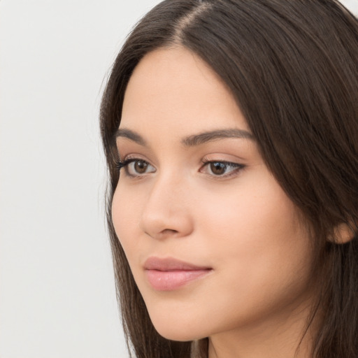 Neutral white young-adult female with long  brown hair and brown eyes