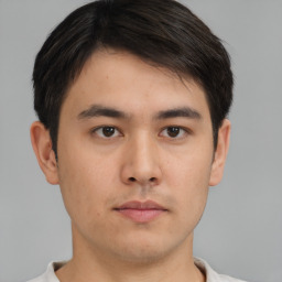 Neutral asian young-adult male with short  brown hair and brown eyes