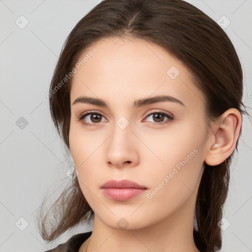 Neutral white young-adult female with medium  brown hair and brown eyes