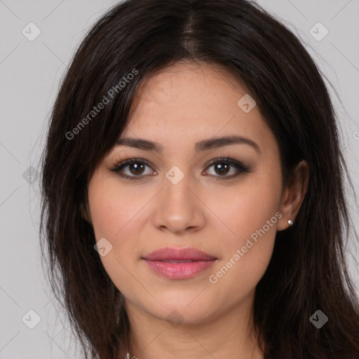 Joyful white young-adult female with long  brown hair and brown eyes