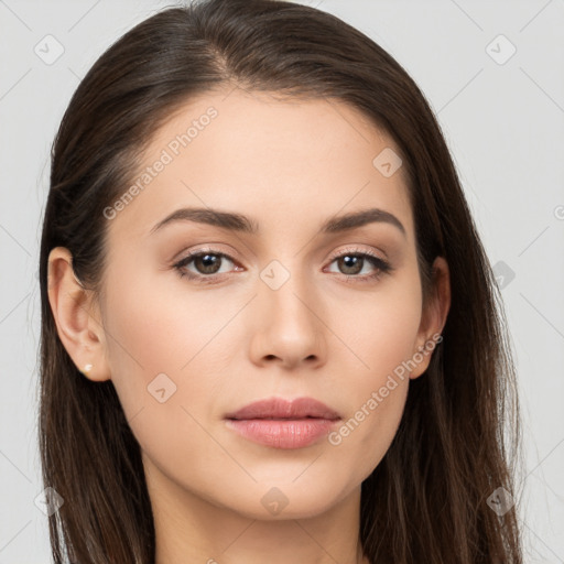 Neutral white young-adult female with long  brown hair and brown eyes