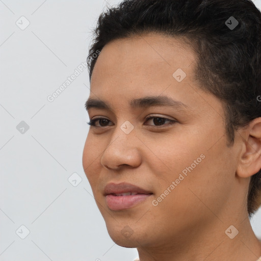 Joyful latino young-adult female with short  brown hair and brown eyes