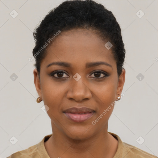 Joyful black young-adult female with short  black hair and brown eyes