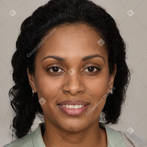 Joyful black young-adult female with long  brown hair and brown eyes