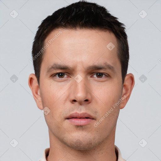 Neutral white young-adult male with short  brown hair and brown eyes