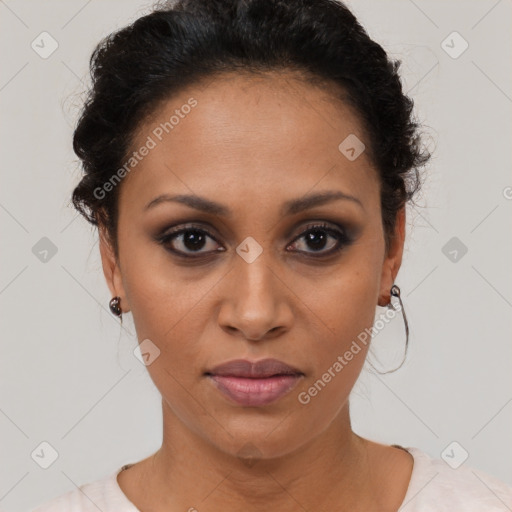 Joyful latino young-adult female with short  brown hair and brown eyes