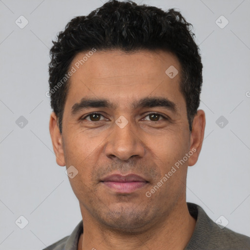 Neutral latino adult male with short  black hair and brown eyes