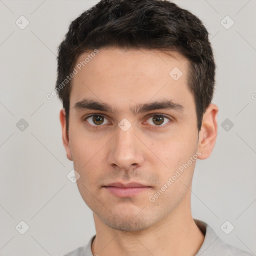 Neutral white young-adult male with short  brown hair and brown eyes