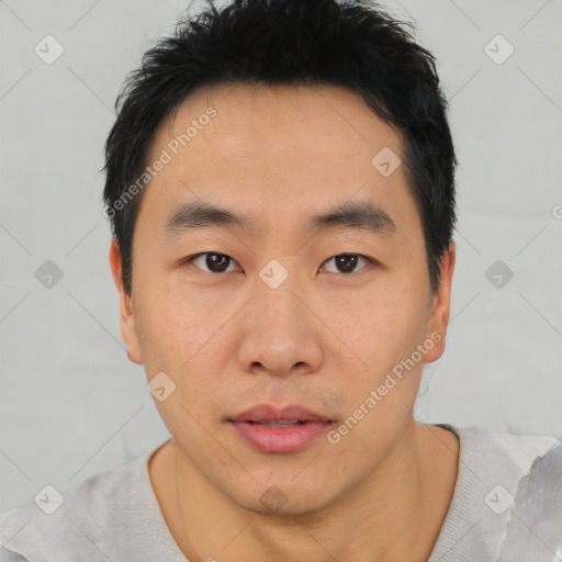 Neutral asian young-adult male with short  black hair and brown eyes