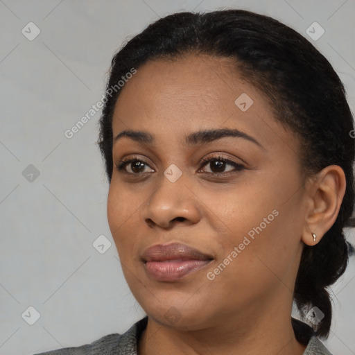 Joyful black young-adult female with medium  black hair and brown eyes