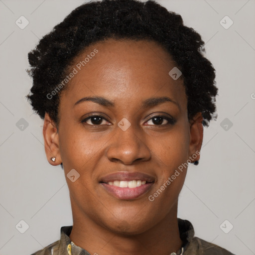 Joyful black young-adult female with short  brown hair and brown eyes