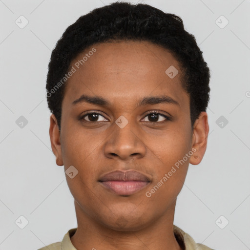 Joyful black young-adult male with short  brown hair and brown eyes