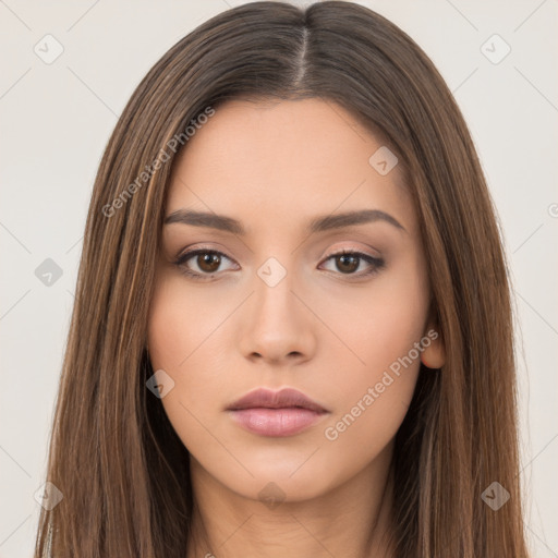 Neutral white young-adult female with long  brown hair and brown eyes