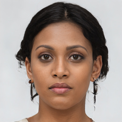 Neutral latino young-adult female with long  black hair and brown eyes