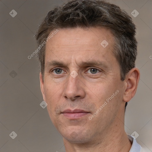 Neutral white adult male with short  brown hair and brown eyes