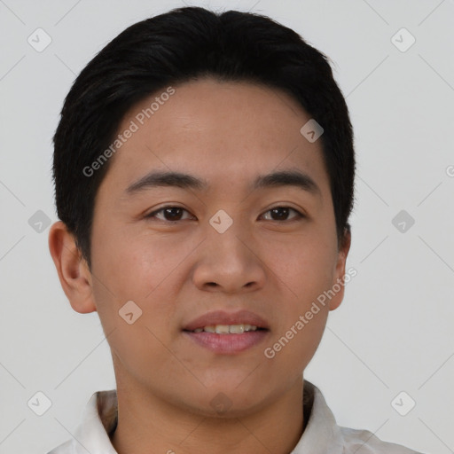 Joyful asian young-adult male with short  black hair and brown eyes