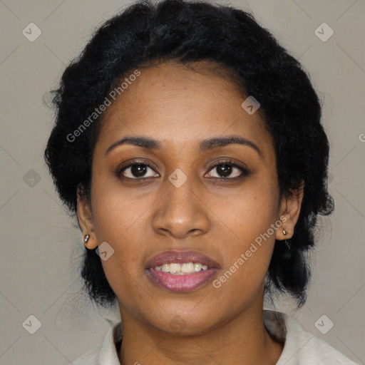 Joyful black young-adult female with medium  black hair and brown eyes