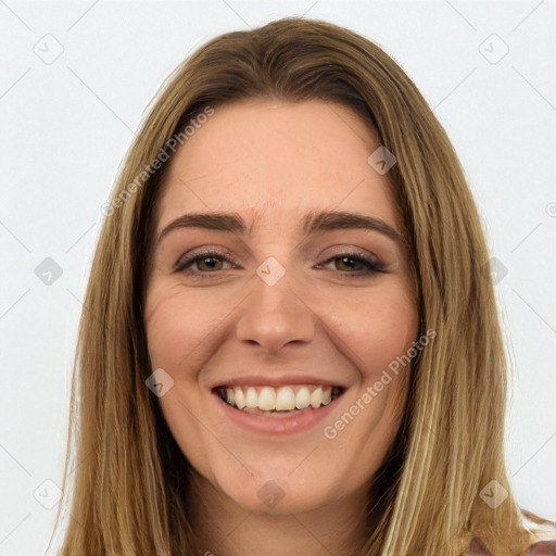 Joyful white young-adult female with long  brown hair and green eyes