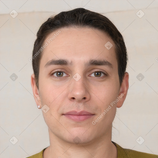 Neutral white young-adult male with short  brown hair and brown eyes