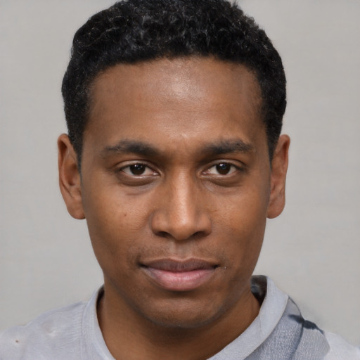 Neutral black young-adult male with short  black hair and brown eyes