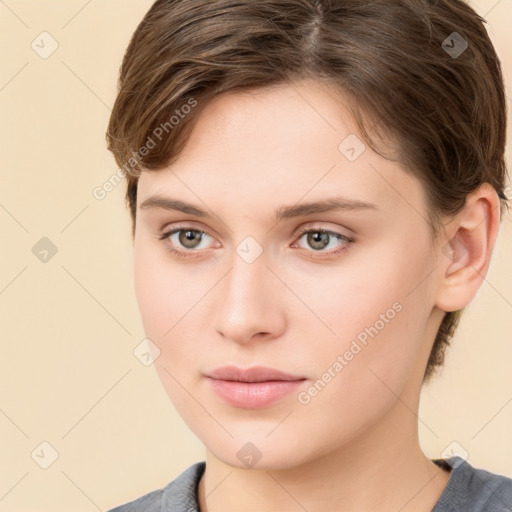 Neutral white young-adult female with medium  brown hair and grey eyes