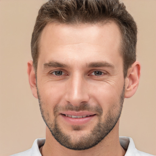 Joyful white young-adult male with short  brown hair and brown eyes