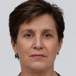 Joyful white adult female with short  brown hair and brown eyes