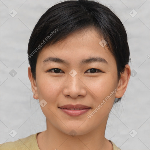 Joyful asian young-adult female with short  brown hair and brown eyes