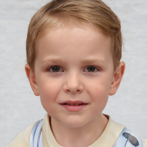 Joyful white child male with short  brown hair and brown eyes