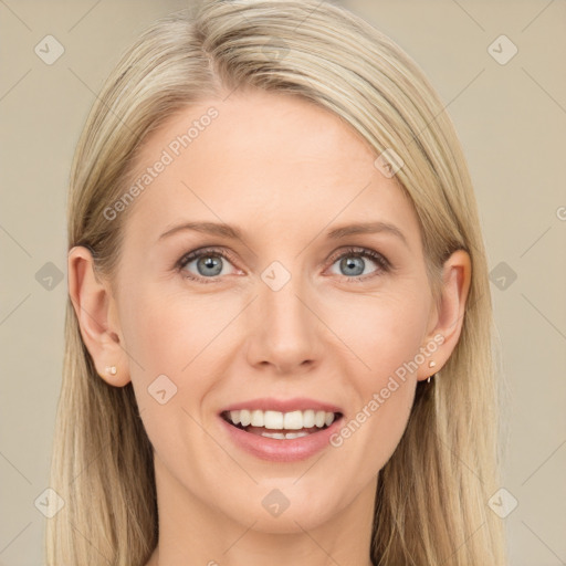 Joyful white young-adult female with long  brown hair and blue eyes