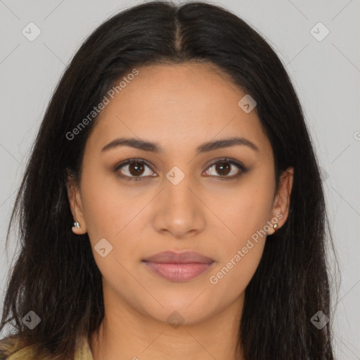 Joyful latino young-adult female with long  brown hair and brown eyes