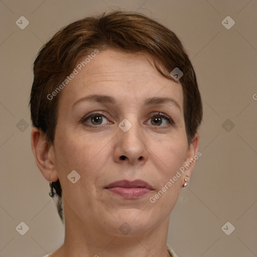 Joyful white adult female with short  brown hair and grey eyes