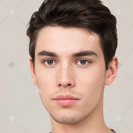 Neutral white young-adult male with short  brown hair and brown eyes