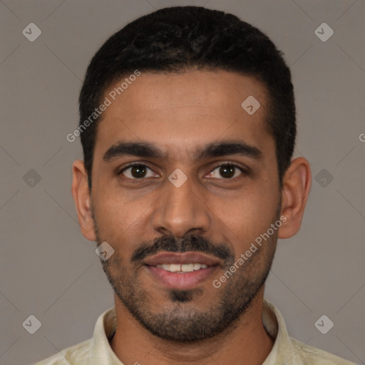 Joyful latino young-adult male with short  black hair and brown eyes