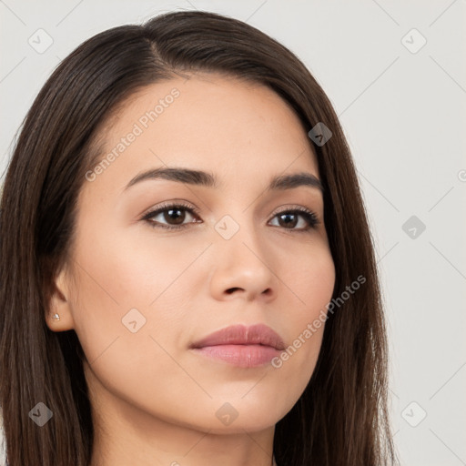 Neutral white young-adult female with long  brown hair and brown eyes