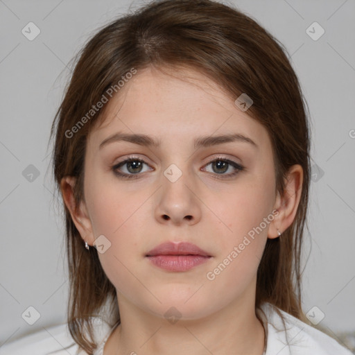 Neutral white young-adult female with medium  brown hair and brown eyes